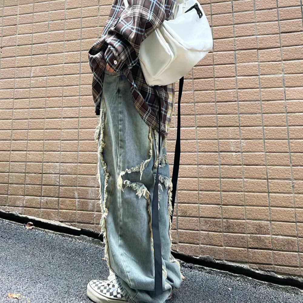 Tearing Graphic Denim Pants